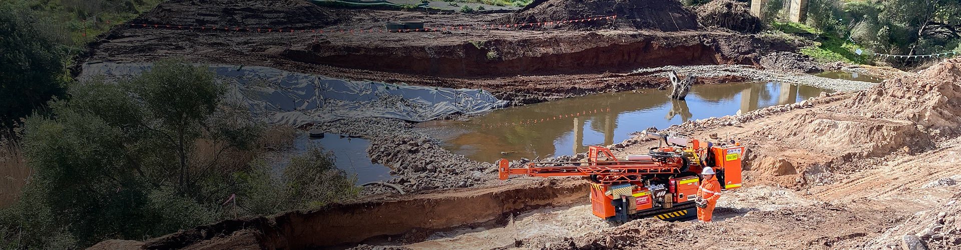 Orange Track Rig beneath bridge in Adelaide, South Australia